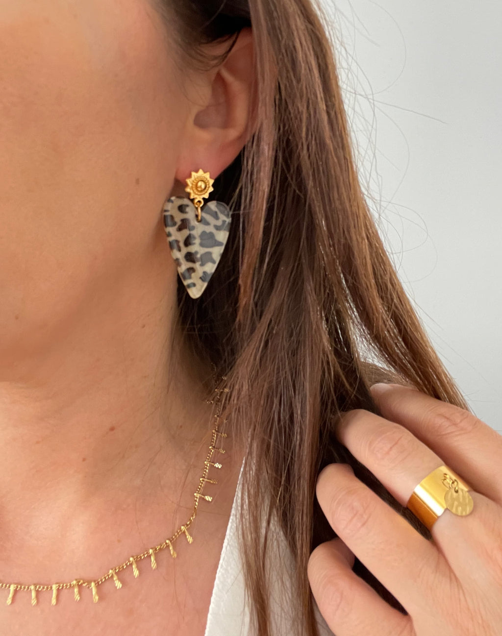 Boucle coeur leopard fermoir soleil acier inoxydable doré